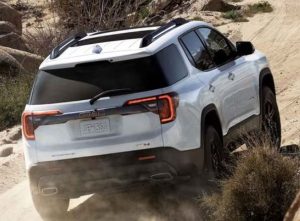 A GMC Acadia driving on a dirt road near Beloit, Wisconsin.